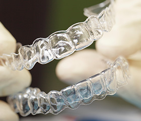 Set of clear Invisalign trays