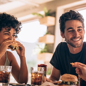 Friends enjoying meal together at restaurant