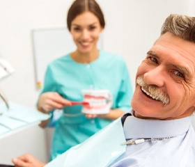 man at a consultation for dentures in Port Orange, FL
