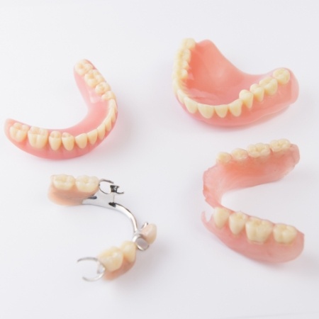 two full dentures and two partials