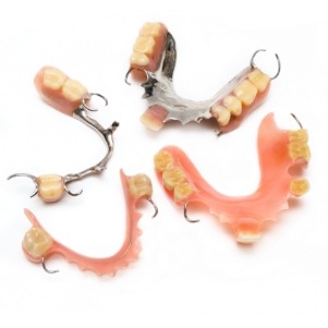 Close up of four partial dentures