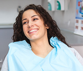 Smiling woman in dental chair