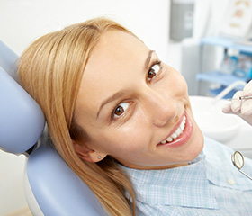 Smiling woman in dental chair