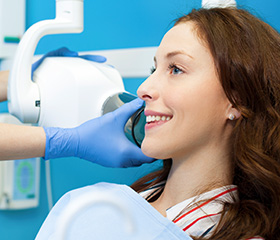 Woman receiving dental x-rays