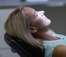 Relaxed woman in dental chair