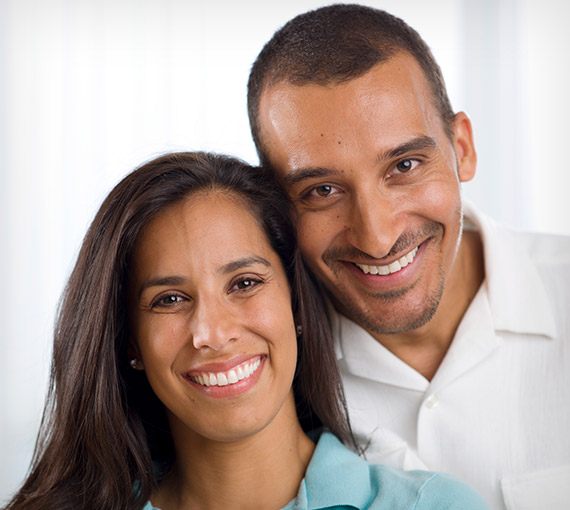 Man and woman smiling together