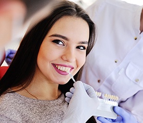 Woman smiling during veneers consultation with Port Orange cosmetic dentist